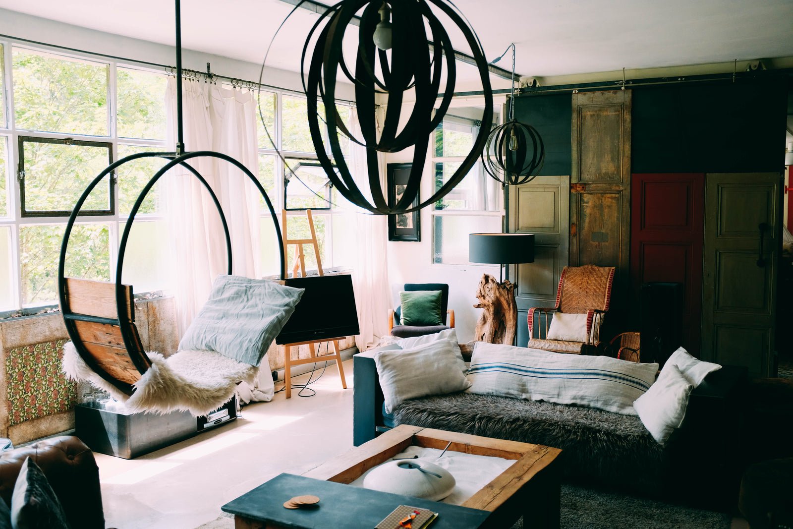 An eclectic room furnished with reclaimed pieces